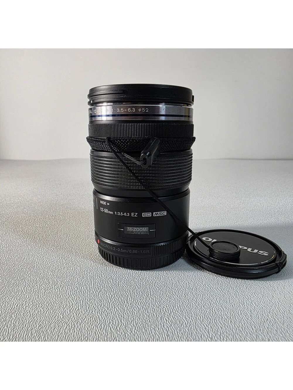 OLYMPUS M. Zuiko Digital 12-50mm f/3.5-6.3 EZ ED MSC Lens Both Caps